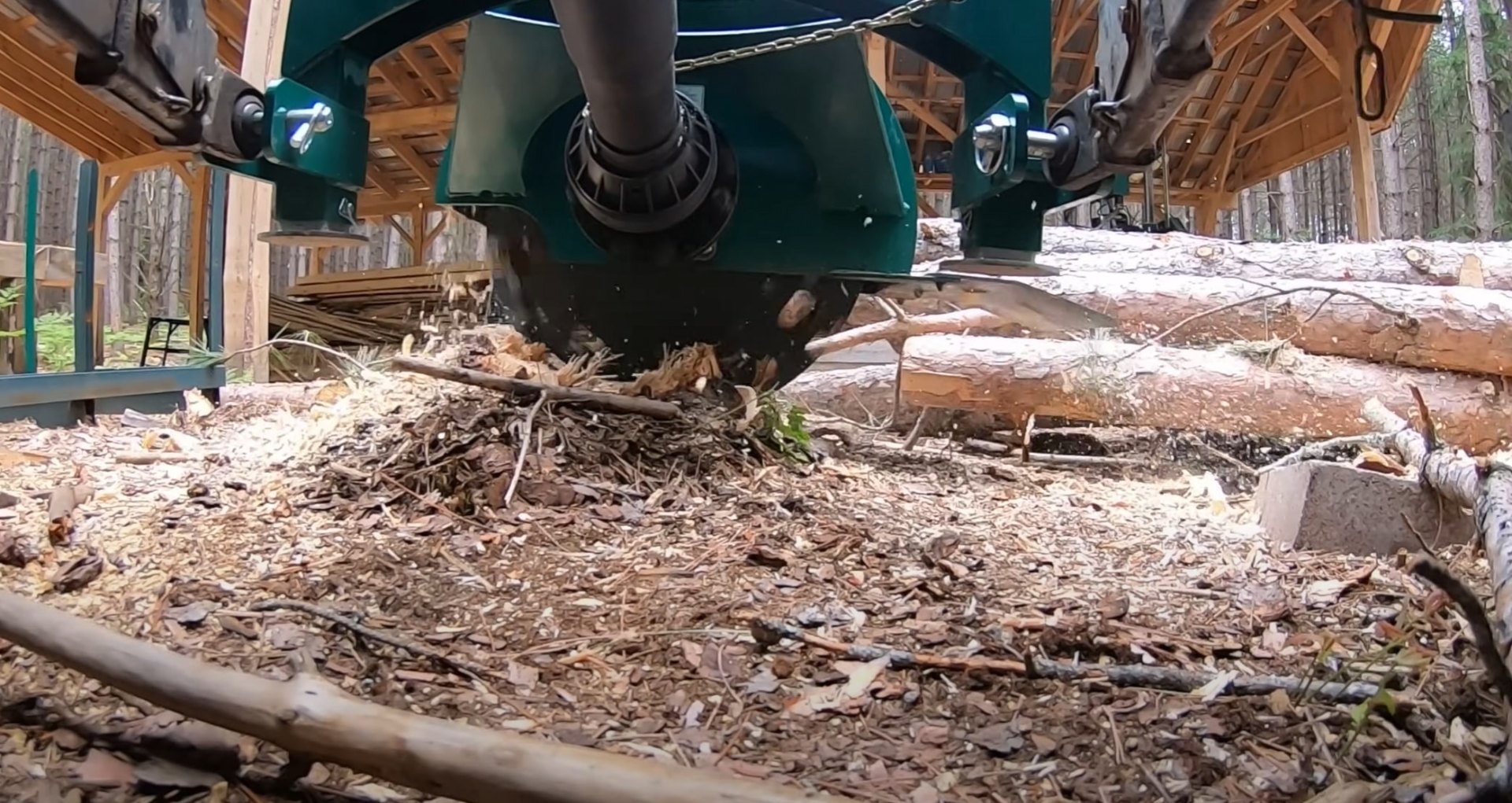 Complete Stump Removal - Industrial equipment for thorough stump elimination Industrial stump grinding equipment processing large tree stumps